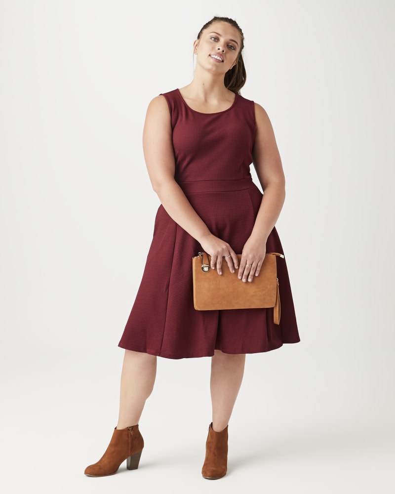 Plus size model with hourglass body shape wearing Ortiga Fit and Flare Dress  by Molly&Isadora | Dia&Co | dia_product_style_image_id:141439